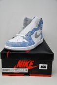 A pair of as new Nike Jordan 1 Retro High OG Hyper Royal (UK 10.5).