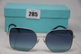 A pair of as new Tiffany & Co sunglasses.