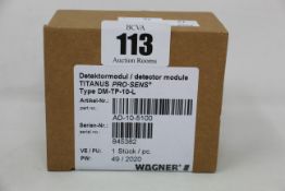 A boxed as new Wagner titanus pro-sens detector module (Type: DM-TP-10-L, Part no: AD-10-5100).