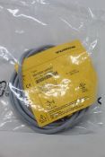 An as new Turck inductive proximity sensor (Ni4-DS20-2AP6X2, 165022).