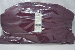 An as new Sweaty Betty Switch reversible puffa jacket in fig red (S - RRP £250).