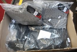 An as new Fox Titan sport jacket in black (size: M) and three pairs of as new Fox Titan racing