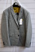 An as new Lindbergh White suit in blue check (Size EU 58 - RRP £190).