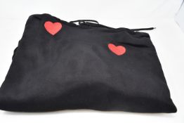 An as new Natasha Zinko Duo embroidered hooded sweatshirt (XS - RRP $152) (Please note the holes/