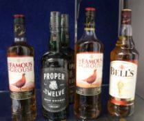 Two bottles of Famous Grouse blended Scotch whisky (1 x 700ml, 1 x 1ltr), a bottle of Bells