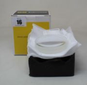 A boxed as new Edmund Optics lens ach 75 x 200 VIS-NIR TS.