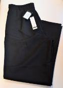 A pair of as new Edward Crutchley black suit style trousers (M).