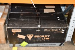 A Secretlab Omega 2020 Softweave Cookies & Cream Gaming Chair.