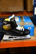 A pair of as new Bauer Supreme 3S ice hockey goalie skates (Size unknown, some damage to box).