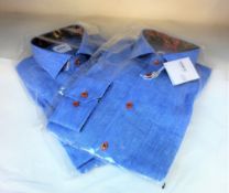 Two as new Oscar of Sweden shirts (Sizes 40 and 44).