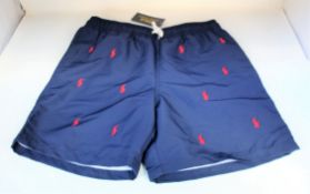Four pairs of youths as new Ralph Lauren Polo Traveler shorts (All 14-16 years).