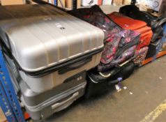 Eight bags / cases of miscellaneous pre-owned clothing and related.