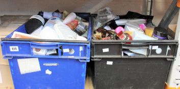Two boxes of assorted toiletries to include shower gels, shampoos, scrubs and creams.