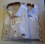 Two as new Oscar of Sweden shirts (Sizes 44 and 46).
