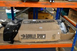 A Gorilla Sports universal weight bench (May be incomplete).