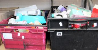 Two boxes of assorted toiletries to include shower gels, shampoos, scrubs and creams.