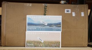 A quantity of Skandinavisk candles and diffusers in a variety of scents (Approximately 20 items).