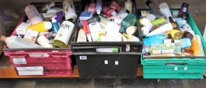 Three boxes of assorted toiletries to include shower gels, shampoos, scrubs and creams.