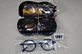 A pair of Anne & Valentin titanium 20A36 glasses frames, a pair of Anne & Valentin Fragola 8C32