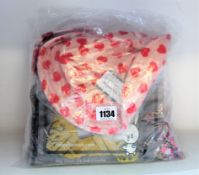 Four as new Natasha Zinko x Duo Ltd hats, two Smile hairpins and four bandana/masks (RRP £20 each).