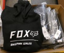 Twenty as new Fox Racing Pro Fleeces in black and grey (Large, all with BikePark Wales logo on the