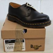 A pair of as new Dr Martens smooth leather shoes (UK 5).