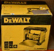 A boxed as new DeWalt DW733 240v Planer/Thicknesser.