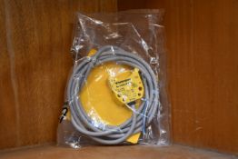 An as new Turck inductive proximity sensor (Ni4-DS20-2AP6X2, 165022).