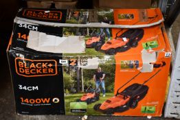 A Black+Decker 1400W 34cm lawn mower.