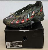 A pair of as new Nike x Supreme Air Max 96 / S in Camo (Box damaged) (Size UK 7).