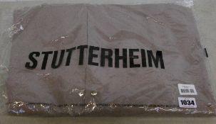 A woman's as new Stutterheim Mosebacke Taupe coat (L).