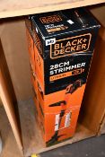 Two as new Black+Decker cordless 28cm strimmers.
