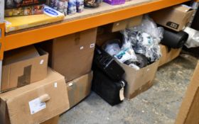 A shelf of miscellaneous industrial and related items.