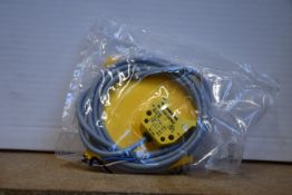 An as new Turck inductive proximity sensor (Ni4-DS20-2AP6X2, 165022).