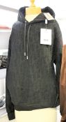 An as new Dior hooded sweatshirt in black (M).