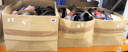 Two boxes of assorted belts and one box of assorted belts/wallets/purses and related items.