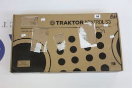 A Native Instruments Traktor Kontrol S3 Essential 4 channel DJ controller.