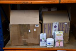 A large quantity of Scentsy products to include; a quantity of wax melts in various scents,