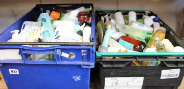 Two boxes of assorted toiletries to include shower gels, shampoos, scrubs and creams.
