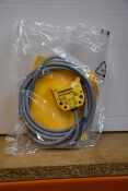 An as new Turck inductive proximity sensor (Ni4-DS20-2AP6X2, 165022).