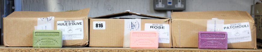A box of La Svonnette huile d'olive 125g bars of soap (Approximately 70) and a box of La
