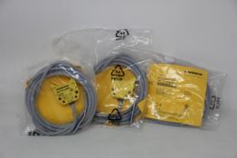 Three as new Turck inductive proximity sensors (Ni4-DS20-2AP6X2, 165022).