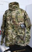 An as new Carinthia TRG jacket in multicam (L).