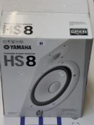 A Yamaha HS8 powered studio monitor speaker.