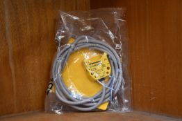 An as new Turck inductive proximity sensor (Ni4-DS20-2AP6X2, 165022).