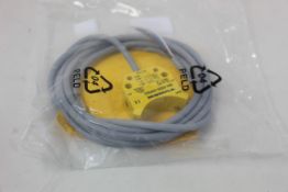 An as new Turck inductive proximity sensor (Ni4-DS20-2AP6X2, 165022).