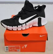 A pair of as new Nike Free Metcon 3 trainers (UK 10).