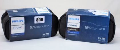 Two Philips Zoom DayWhite 6% Hydrogen Peroxide and two NiteWhite 16% Carbamide Peroxide (6 packs).