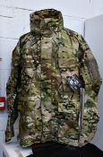 An as new Carinthia TRG jacket in multicam (L).