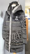 An as new Desigual padded NOA black coat (UK 12).